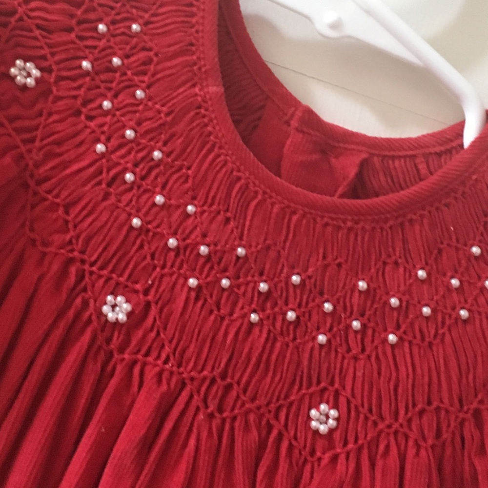 Smocked dress with pearl accents